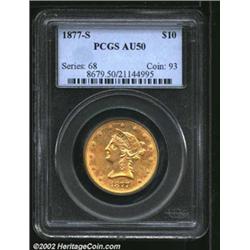 1877-S $10 AU50 PCGS. Sharply struck and only lightly abraded. The stars and legends have bright lus
