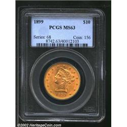 1899 $10 MS63 PCGS. Lustrous under light orange-gold toning, with light luster grazes befitting the.