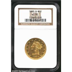 1882-O $10 AU50 NGC. A bold example that has light rub on the chin, brow, and wingtips. Abundant hin