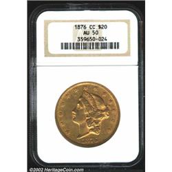 1876-CC $20 AU50 NGC. A relatively clean Carson City example that has greenish gold color and no sho