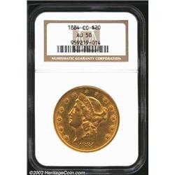 1884-CC $20 AU50 NGC. Nice, golden-yellow surfaces with light wear on the highest points and conside