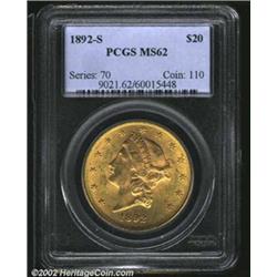 1892-S $20 MS62 PCGS. A lustrous piece with yellow-green fields and rich orange-gold color on the de