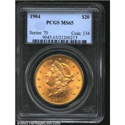 1904 $20 MS65 PCGS. With glowing orange-gold color and a smooth, almost distraction-free appearance,