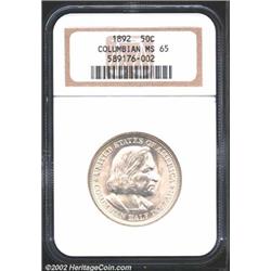 1892 50C Columbian MS65 NGC. Light olive-gold patina. A flashy Gem with a good strike and unabraded.