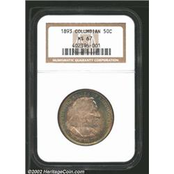 1893 50C Columbian MS67 NGC. Spectacular sea-green, gold, and lavender patina. Well struck and immac