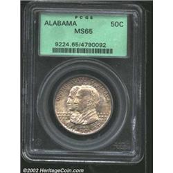 1921 50C Alabama MS65 PCGS. The otherwise golden tinged patina deepens ever so slightly to dove-gray