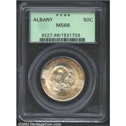 1936 50C Albany MS66 PCGS. A lustrous Gem that has a nearly pristine obverse. A coin that spent many