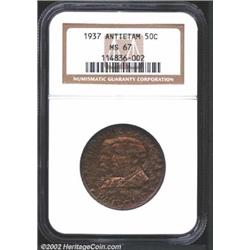 1937 50C Antietam MS67 NGC. An exemplary Antietam that appears flawless, but with a dual persona. Th