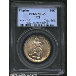 1921 50C Pilgrim MS65 PCGS. Original yellow-green and orange-rose patina. A well struck Gem with fla