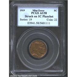 1919 5C Nickel--Struck on a Cent Planchet--AU58 PCGS. The top of the obverse (and bottom of the reve