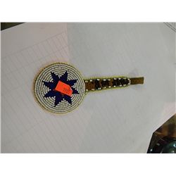 LEATHER AND BEADED BADGE - STAR