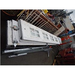 GARAGE DOOR - 9' X 7' HIGHT - INSULATED - ONE PANEL LIGHTED - WITH ROLLERS AND HARDWARE