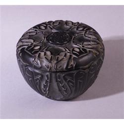 "Quatre Scarabees," a LALIQUE box, circa 1911, in black glass with white patina. Engraved R. Lali…