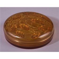 "Cleones," a LALIQUE box, circa 1921, in amber glass. Molded R. LALIQUE, engraved France. M p. 23…