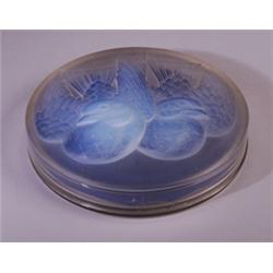 "Saint-Marc," a LALIQUE box, circa 1922, in opalescent glass. Molded R. LALIQUE. M p. 238, no. 81…