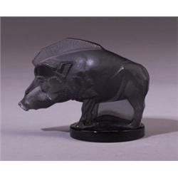 "Sanglier," a LALIQUE automobile hood ornament, circa 1929, in topaz glass. Molded R. LALIQUE, an…