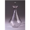 Image 1 : "Selestat," a LALIQUE decanter and stopper, circa 1925, in clear glass with applied black glass r…