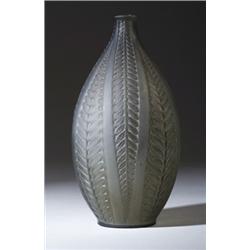 "Acaia," a LALIQUE vase, circa 1921, in topaz glass. Molded R. LALIQUE. M p. 428, no. 949 20cm he…