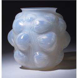 "Tulipes," a LALIQUE vase, circa 1930, in opalescent glass. Engraved R. Lalique France. M p. 449,…