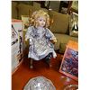 Image 1 : COLLECTOR'S DOLL ON ROCKER