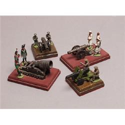 Set of Four Painted Lead Figural Groups 