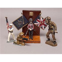 Four Larger Painted Metal Military Figures