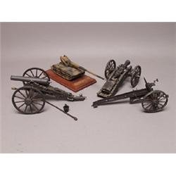 Three Painted Plastic Cannons and a M107 Tank