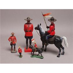 Five Plastic Canadian Mountie Figures