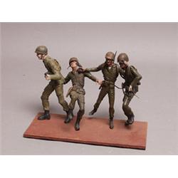 Group of Four Painted G.I. Figures