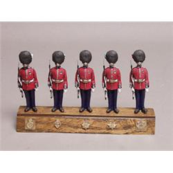 Group of Five British Palace Guards Painted Metal Figures