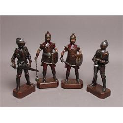 Four Painted Composition Soldiers