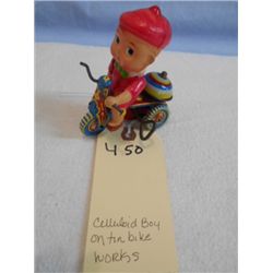 Celluloid Boy on Tin Bike (works)