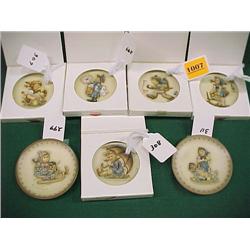 Seven Miniature Hummel Plates...