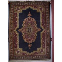 9 1/2' x 6 1/2' Machine Woven Wool Rug...