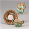ENGLISH MAJOLICA teacup and saucer and milk jug, circa 1875, possibly WARDLE AND COMPANY, with ba…