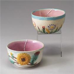 Two similar ENGLISH MAJOLICA sugar bowls, circa 1880, each with floral pattern on white pebbled g…