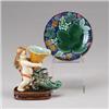 A Victorian style MAJOLICA vase, modern, modeled as a putto holding a cornucopia, together with G…