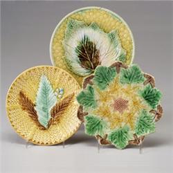 Three MAJOLICA side plates, circa 1875, all with various leaf patterns on yellow ground. Minor ri…