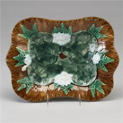 JOSEPH HOLDCROFT MAJOLICA bread tray, circa 1875, with pond lily design. Impressed J. HOLDCROFT. …