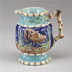 ENGLISH MAJOLICA stork jug, circa 1875, attributed to Joseph Holdcroft, patterned with storks and…
