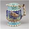 ENGLISH MAJOLICA stork jug, circa 1875, attributed to Joseph Holdcroft, patterned with storks and…