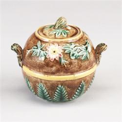 ENGLISH MAJOLICA sugar bowl and cover, circa 1875, with floral and fern design on brown rustic gr…