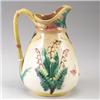 SAMUEL LEAR MAJOLICA jug, circa 1880, with lily-of-the-valley pattern and yellow rope handle on w…