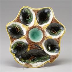 ENGLISH MAJOLICA oyster plate, dated 1870, with six oyster wells and a large cracker well modeled…