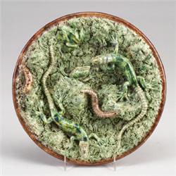 PORTUGUESE MAFRA PALISSY WARE charger, circa 1900, applied with three naturalistically modeled li…