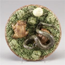 PORTUGUESE MAFRA PALISSY WARE charger, circa 1900, applied with naturalistically modeled serpent,…