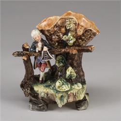 Continental BARBOTINE figural vase, probably Austrian, circa 1900, modeled as a young courtier le…