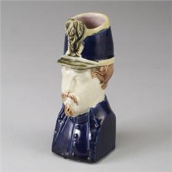 FRENCH MAJOLICA figural vase, circa 1880, modeled as the bust of a military officer with cobalt b…