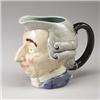 SARREGUEMINES MAJOLICA face jug, circa 1900, modeled as the head of a bewigged 18th Century gentl…