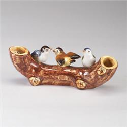 JEROME MASSIER MAJOLICA figural vase, 20th century, modeled as three birds perched on a hollow lo…